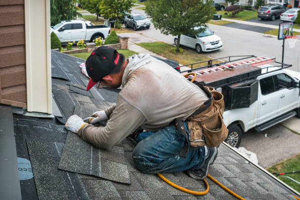 Professional Roofing technician working in Warren, PA